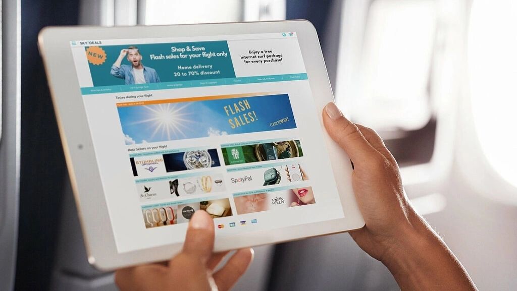 In-flight entertainment screen showing a shopping catalogue